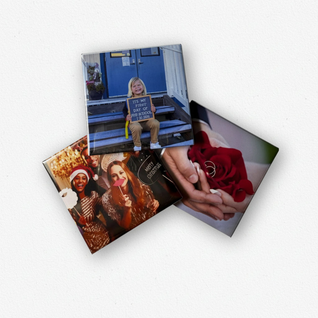 Four photo magnets with different images 